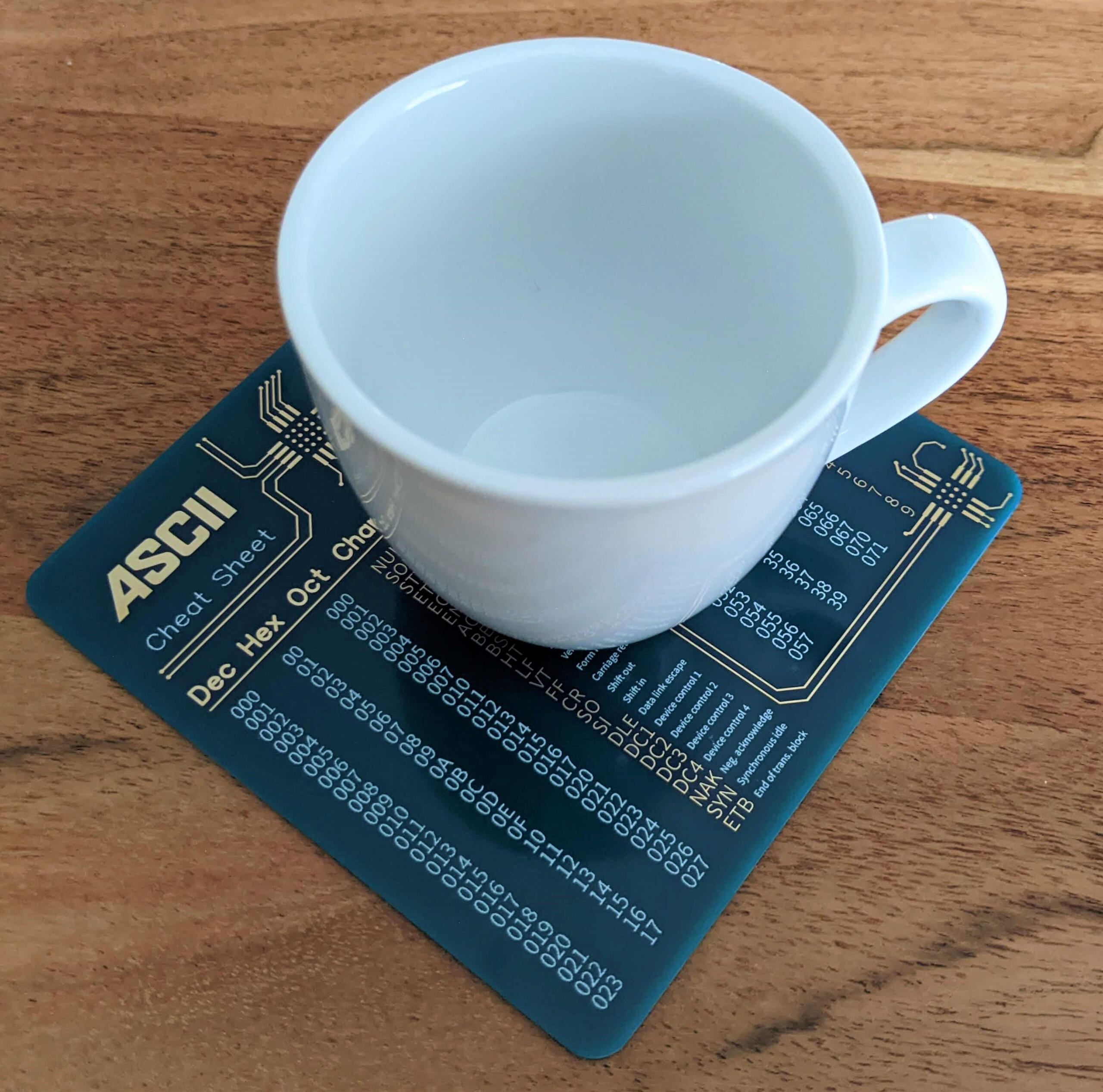 Blue ASCII Table Cheat-Sheet on a real PCB - Cup