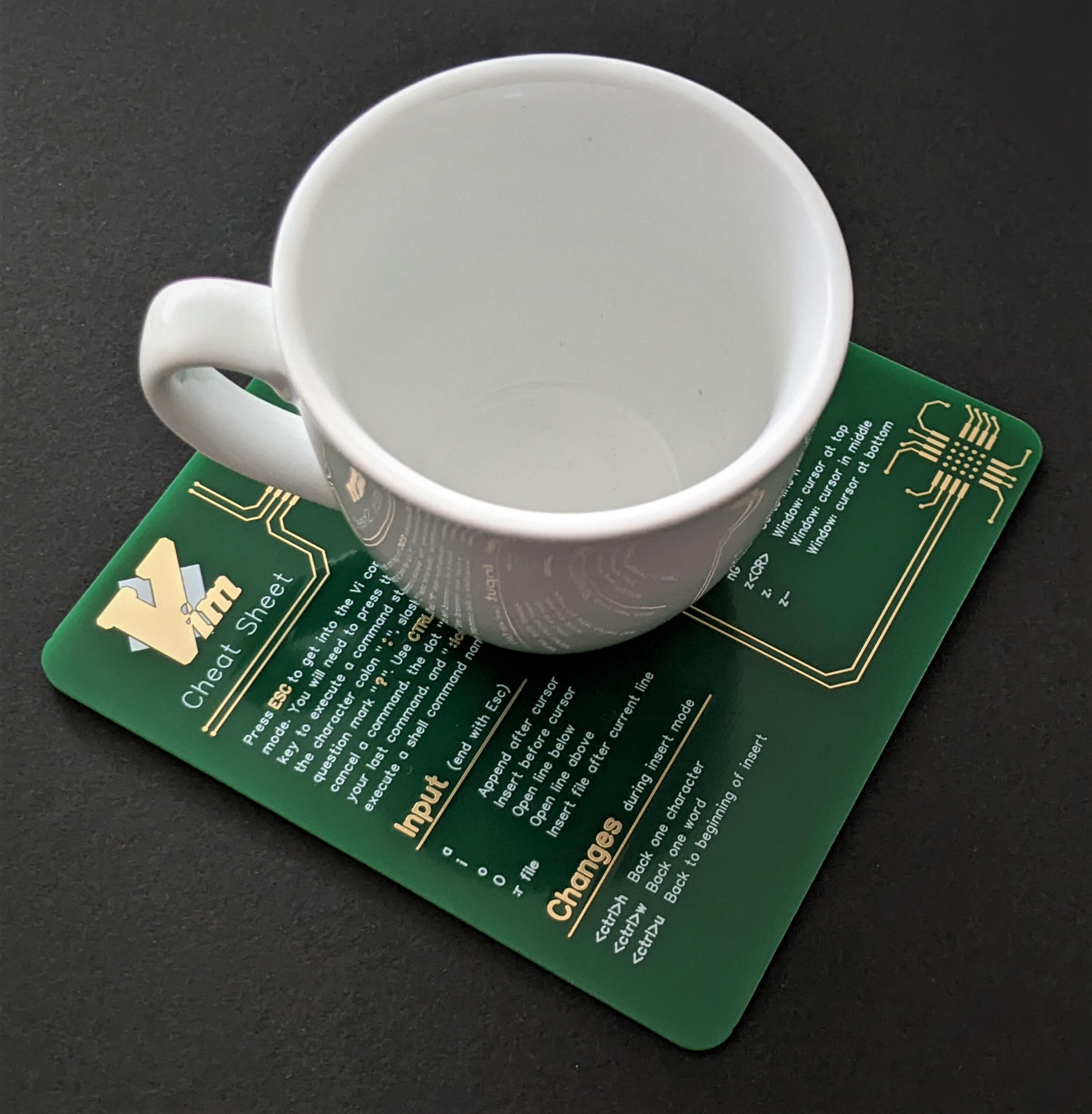 Green Vim Cheat-Sheet on a real PCB - Cup